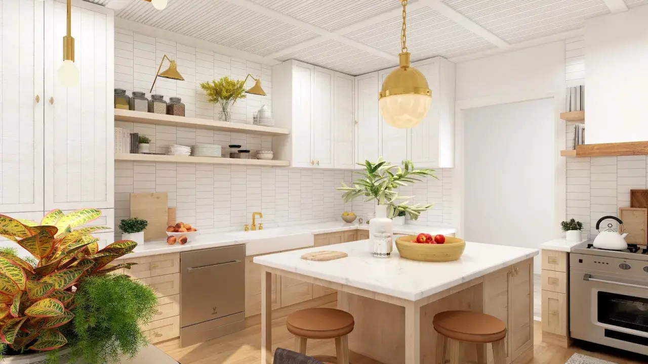 Cocina moderna con isla central, gabinetes blancos y detalles dorados. Ideas para como diseñar una cocina funcional y elegante.