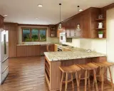 Cocinas abiertas al salón con barra de madera y taburetes. Encimeras de granito, electrodomésticos de acero inoxidable y suelo de parqué.
