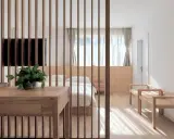 Ideas para como decorar un comedor sencillo: mesa de madera, separador de listones, cama y bancos de madera.