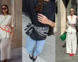 Tres mujeres lucen un foulard Bassetti atado a la cintura, aportando un toque de color y estilo a sus atuendos.