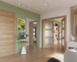 Puertas de roble con paneles de cristal, combinan con paredes verdes y suelo de madera.
