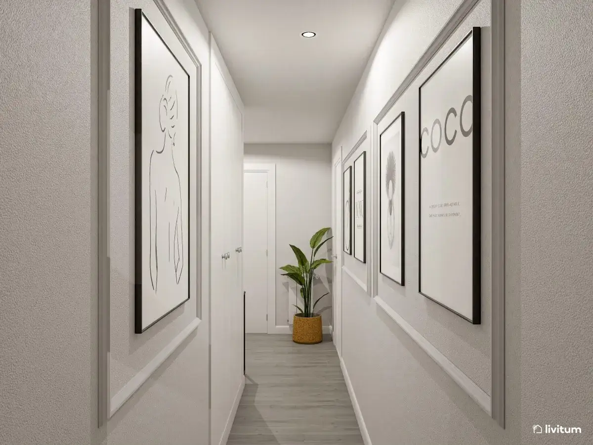 Pasillos con encanto, decorados con arte minimalista y una planta verde, invitan a un recorrido sereno y elegante.